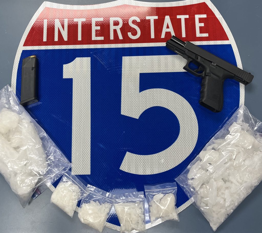 D6 news release picture of seized drugs and gun