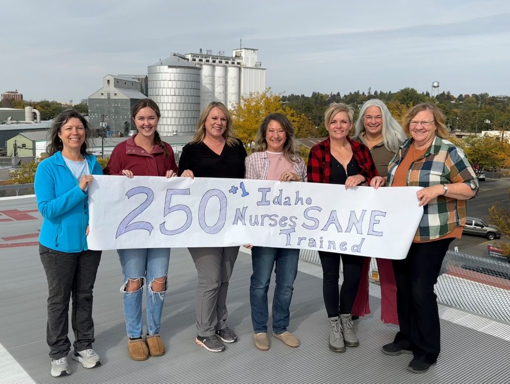 Group of Nurses holding up "250 SANE Nurses" sign