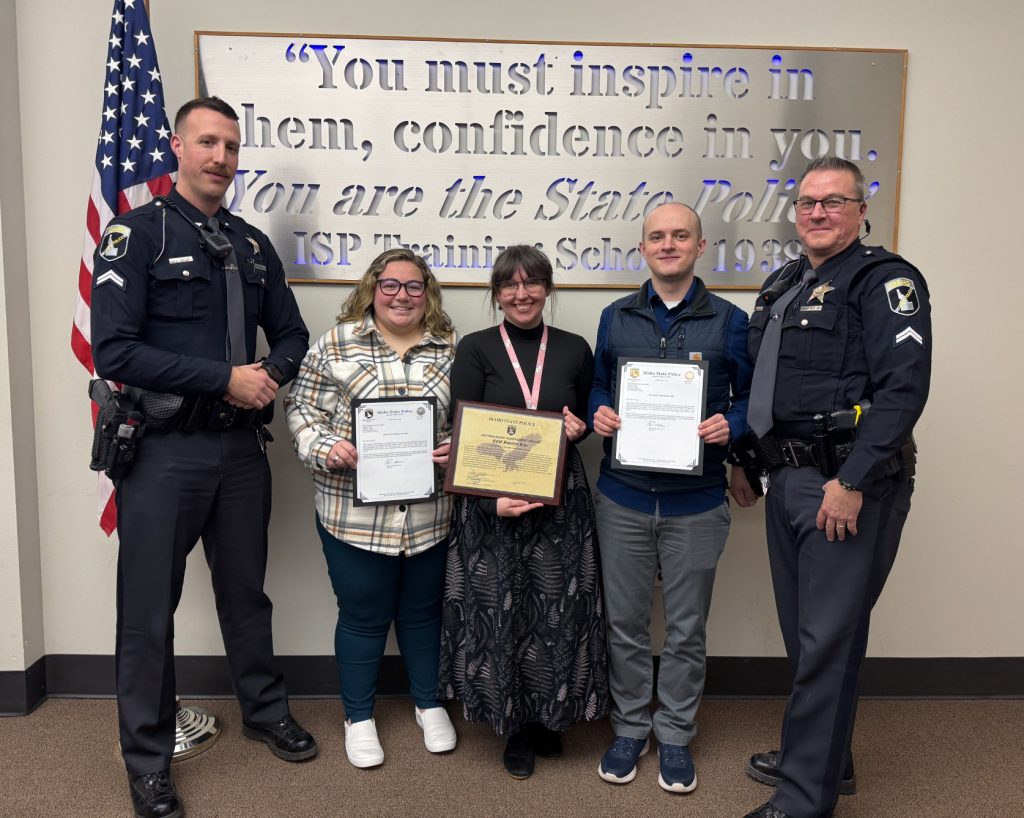 RCC Dispatchers & troopers with award for service