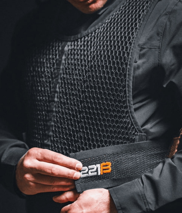 Black Maxx-Dri Vest 5.0 cooling vest on man. Photo courtesy of 221B Tactical website