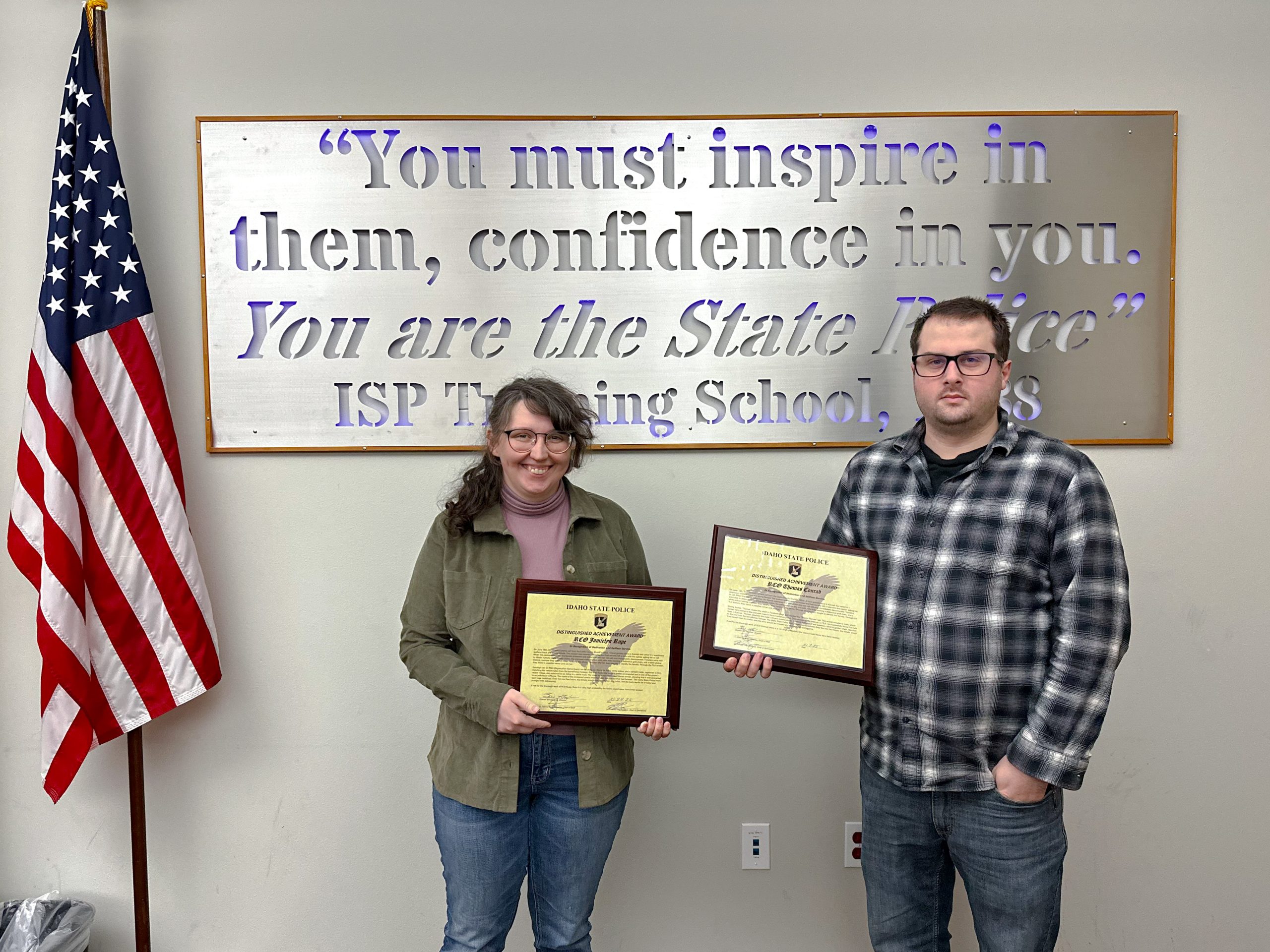 Regional Communications Officers Thomas Conrad and Jamielyn Rupe presented with Distinguished Achievement Awards