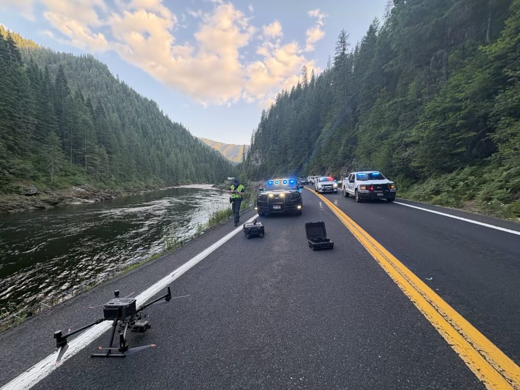 Kooskia triple fatality motorcycle crash. Investigating trooper vehicles next to the river.